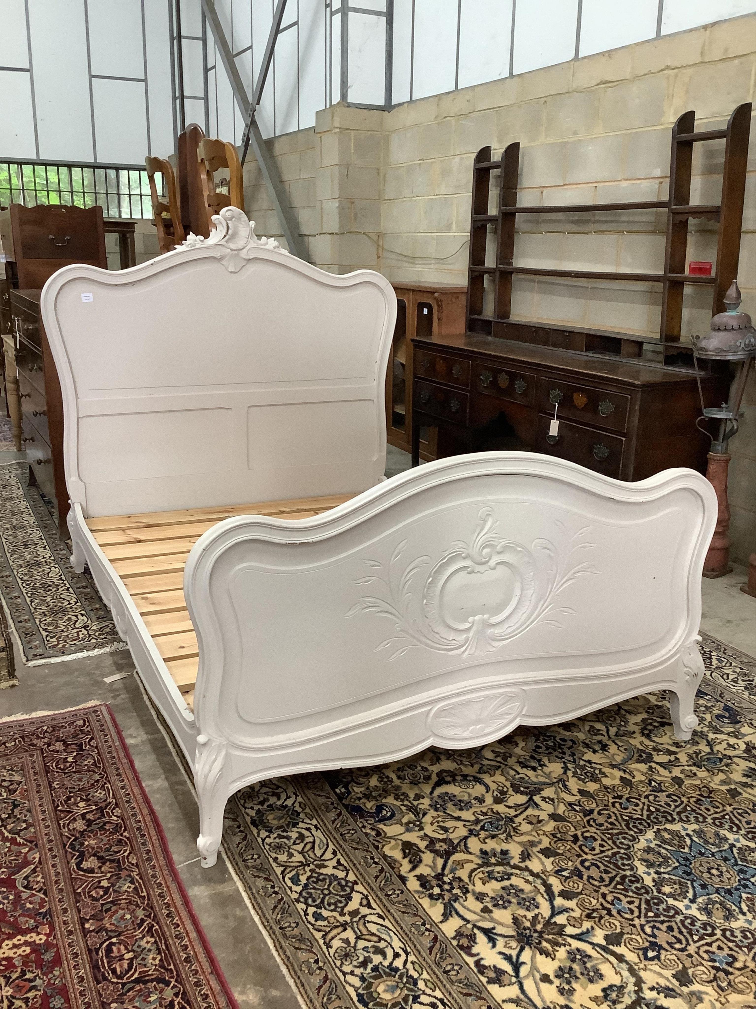 An early 20th century French double bed frame, later painted, width 138cm, length 205cm, height 144cm. Condition - fair